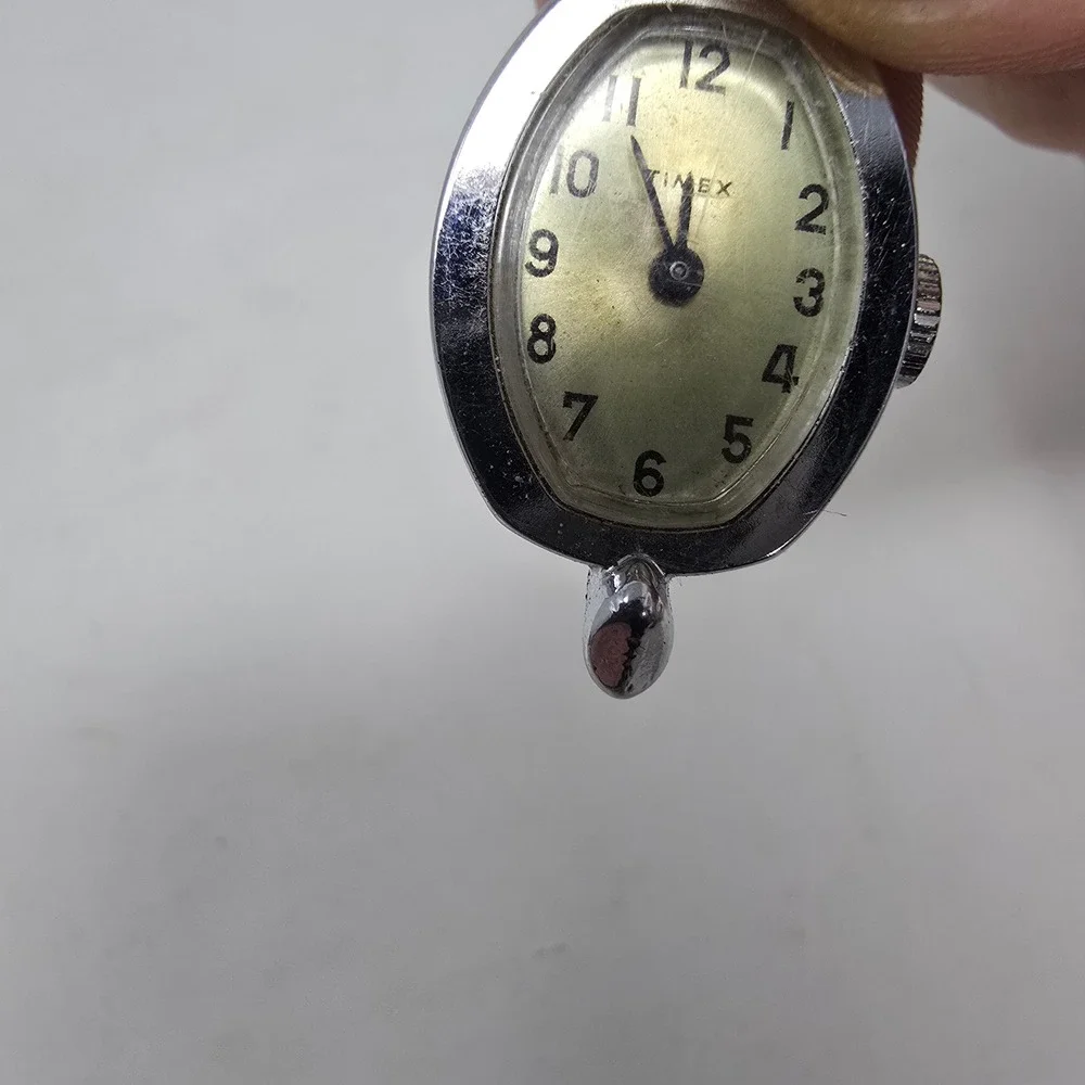 Vintage Timex Womens Oval Watch Face Silver Tone Chrome Plated Base Metal Bezel